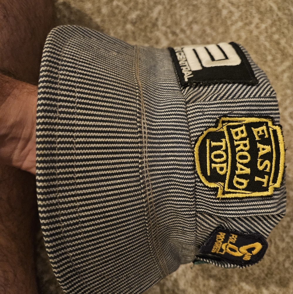 Vintage train conductor/engineer hat.  Hat contains various RR patches
